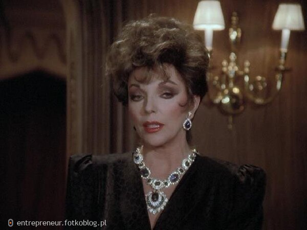 Joan Collins as Alexis 38