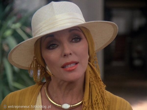 Joan Collins as Alexis 53