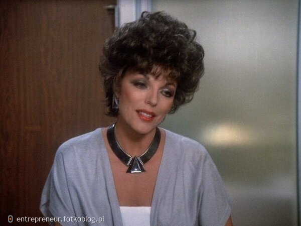 Joan Collins as Alexis 59