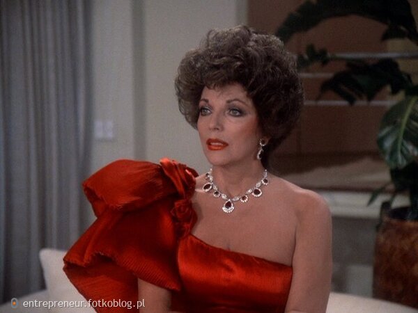 Joan Collins as Alexis 60