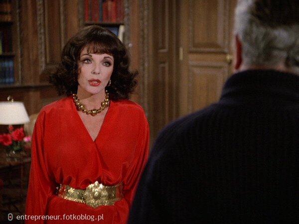 Joan Collins as Alexis 65